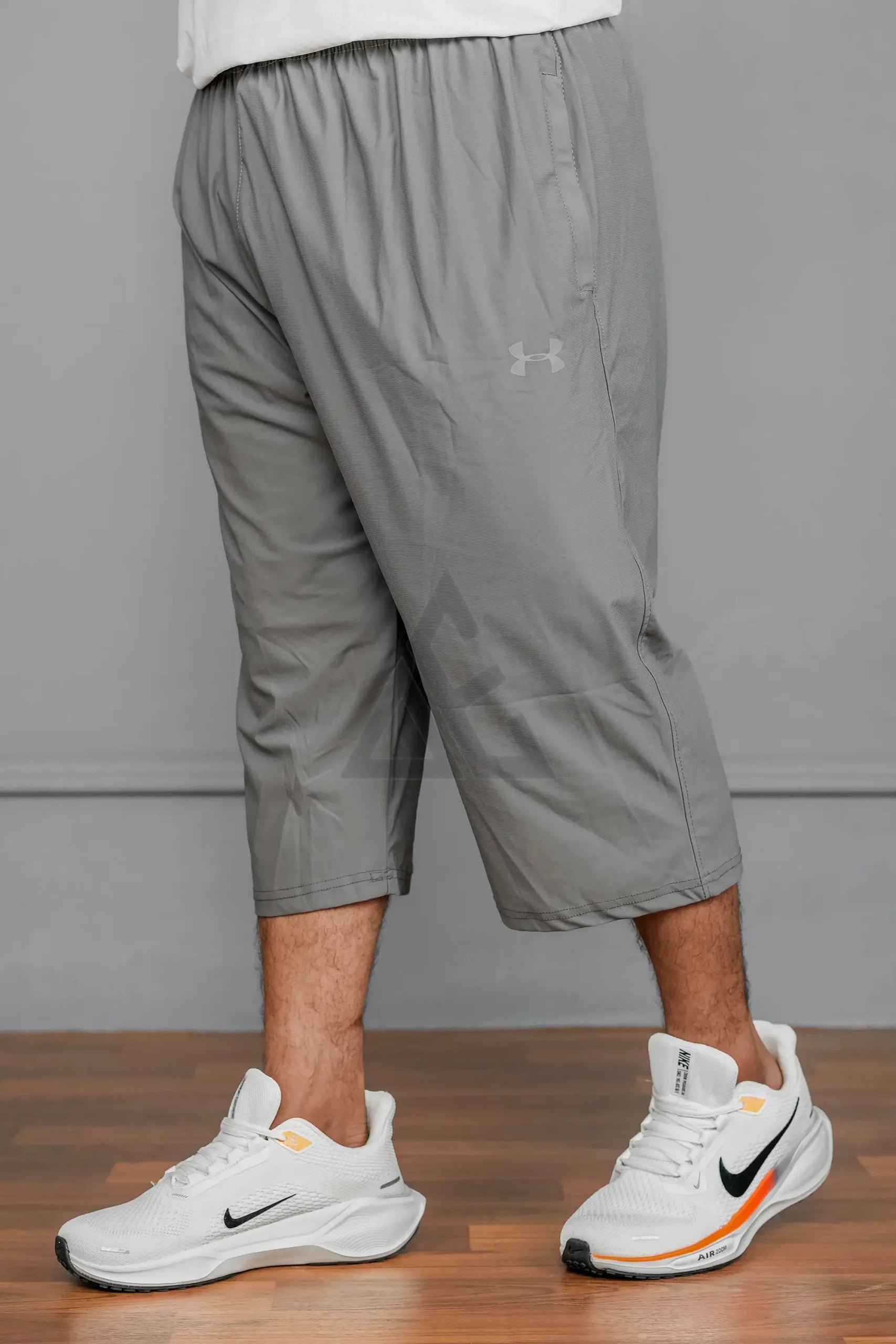 UA 3 Qtr Drifit Short T12 - Grey